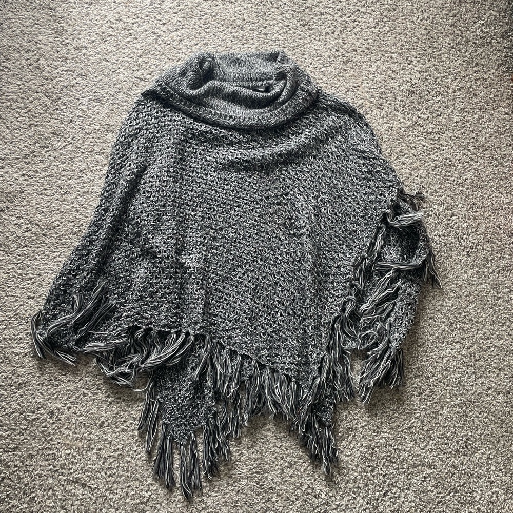 gray white and black poncho